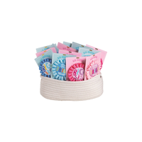 Collection of 'Big Sister' ribbons in various colors displayed in a woven basket on a white background.