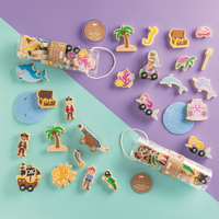Collection of pirate and mermaid-themed decorative blocks on a two-tone purple and teal background.