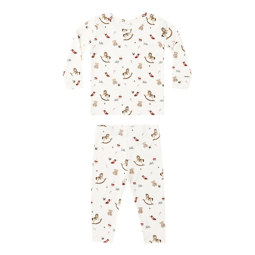 Children's two-piece pajama set with rocking horse animal pattern on a white background.