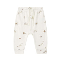 White baby drawstring pants with bunny print on a white background