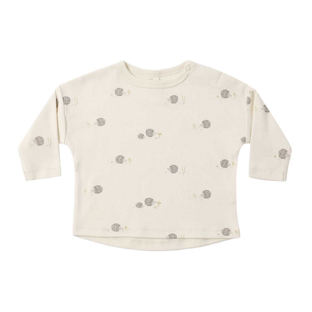 Baby long-sleeve shirt with hedgehog pattern on a white background.