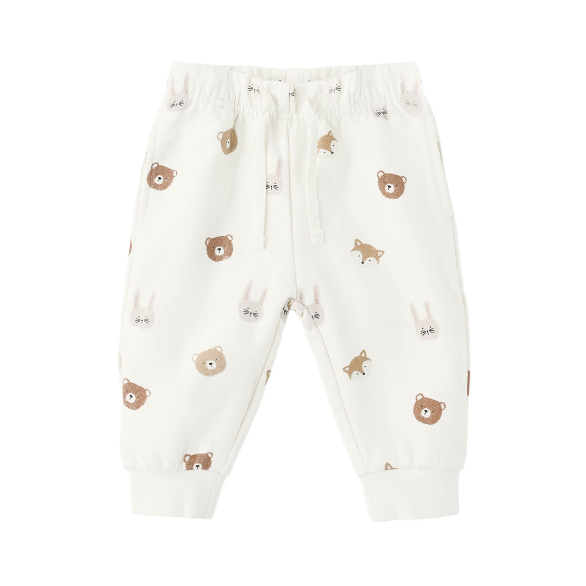 White baby sweat pants with brown bear patterns on a white background.