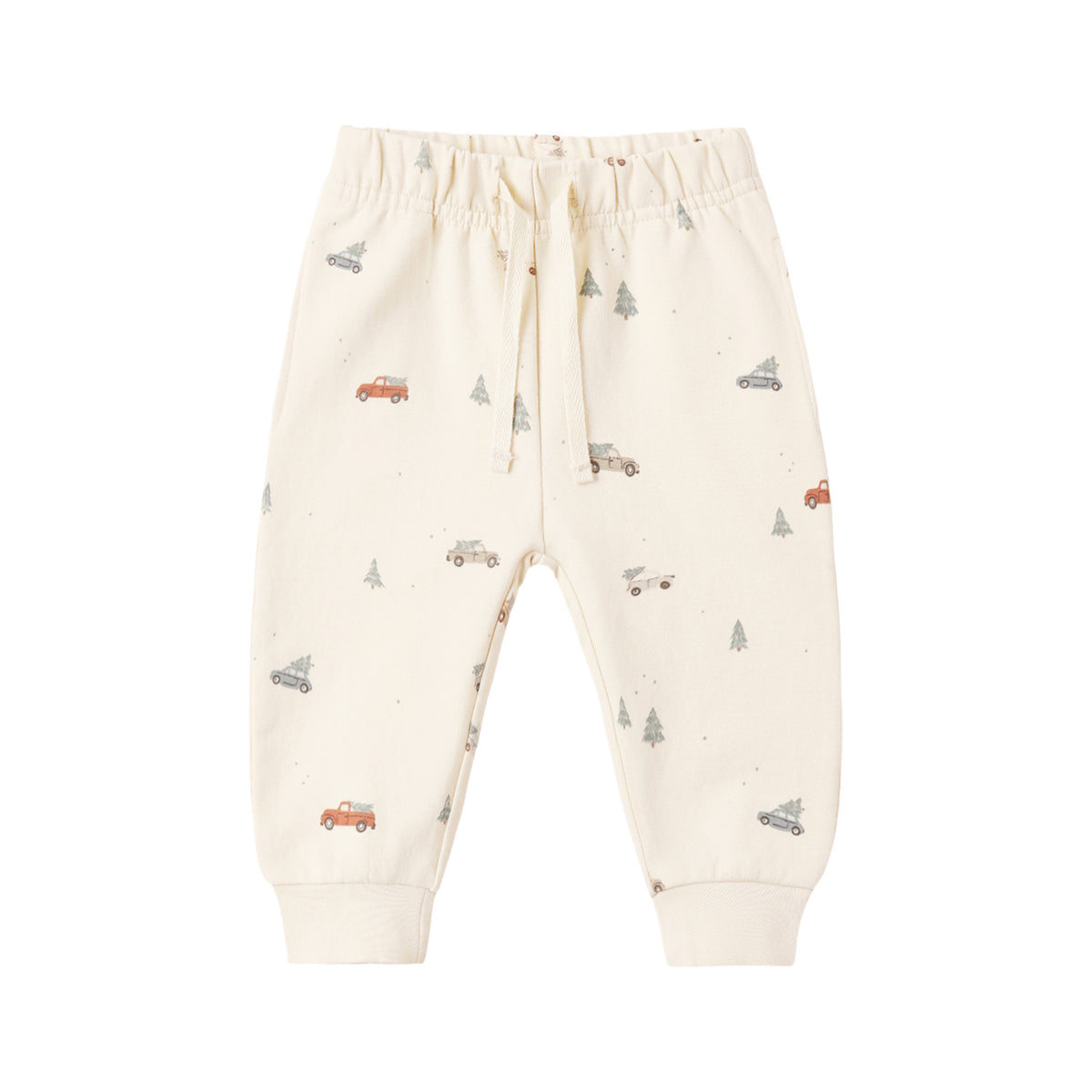 Beige children's sweatpants with car pattern on a white background.