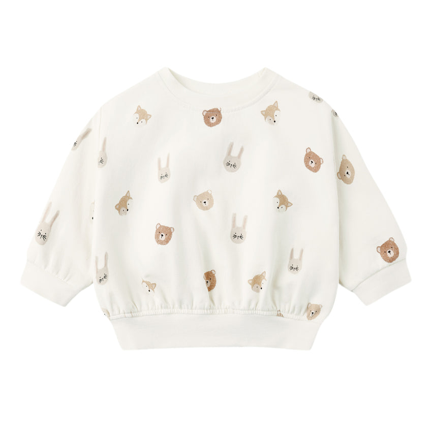 White sweatshirt with bear and bunny pattern on a white background.