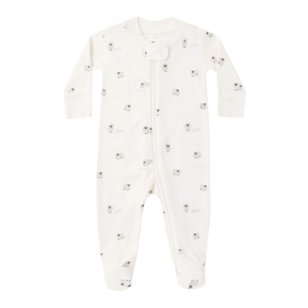 White baby footie  with small sheep patterns on a white background.