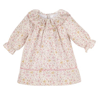 Pink floral patterned dress with ruffled collar and sleeve cuffs on a white background.