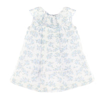 Sleeveless white dress with blue floral pattern on a white background.
