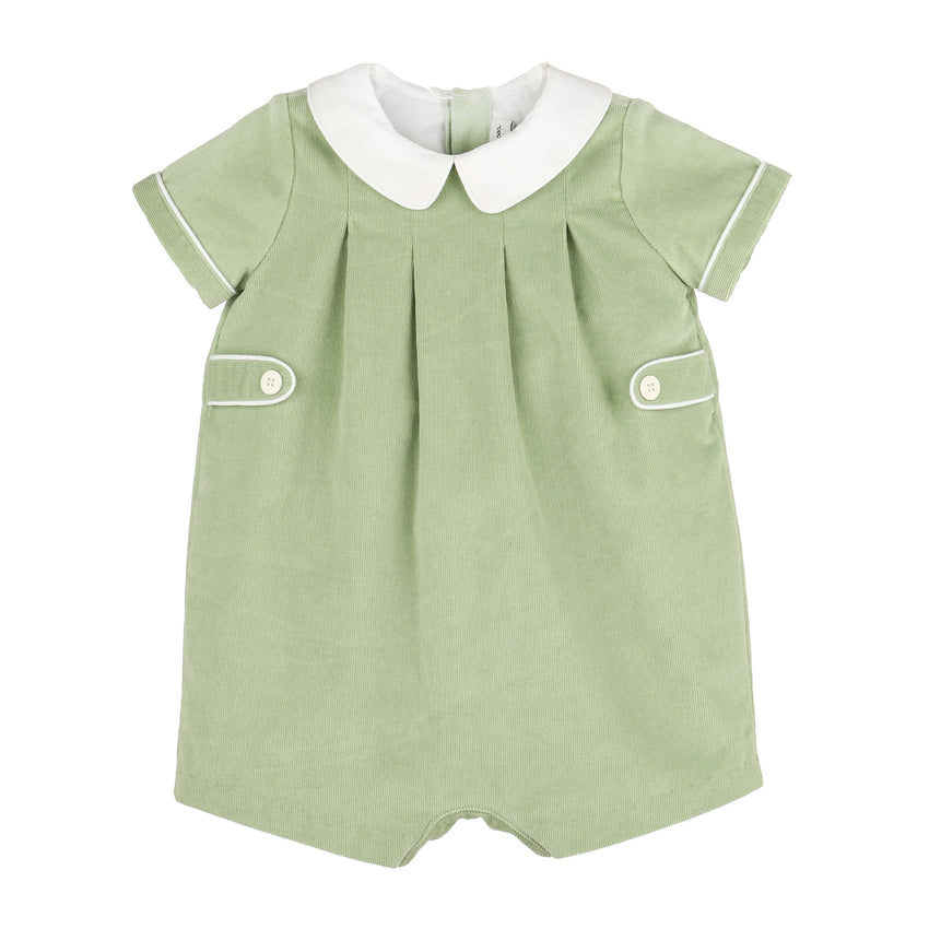 A short-sleeve romper in sage green with a white Peter Pan collar and white piping details, shown against a plain white background.