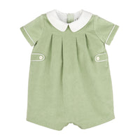 A short-sleeve romper in sage green with a white Peter Pan collar and white piping details, shown against a plain white background.