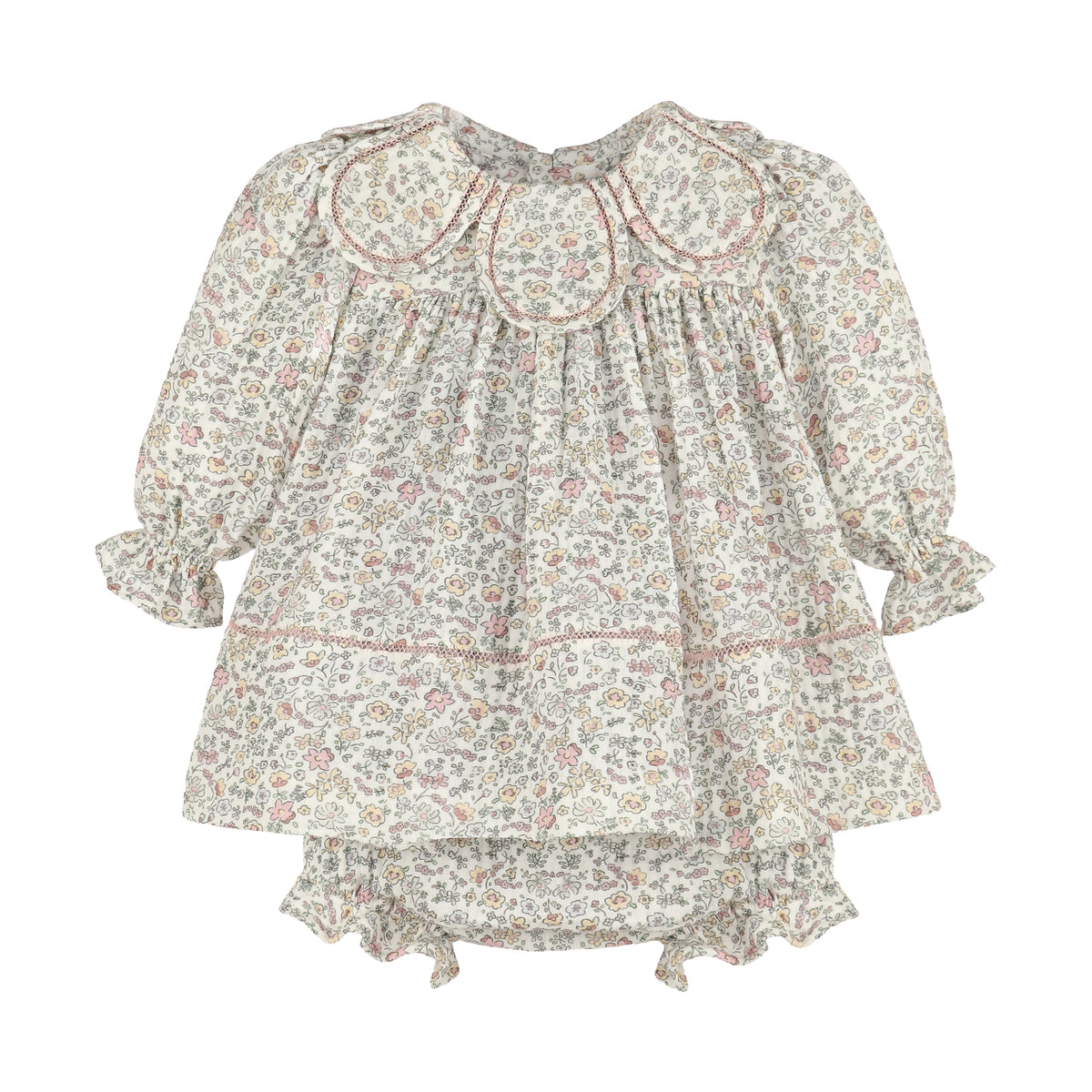 Floral print dress with petal collar with long sleeves and bloomers on a white background.