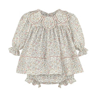Floral print dress with petal collar with long sleeves and bloomers on a white background.