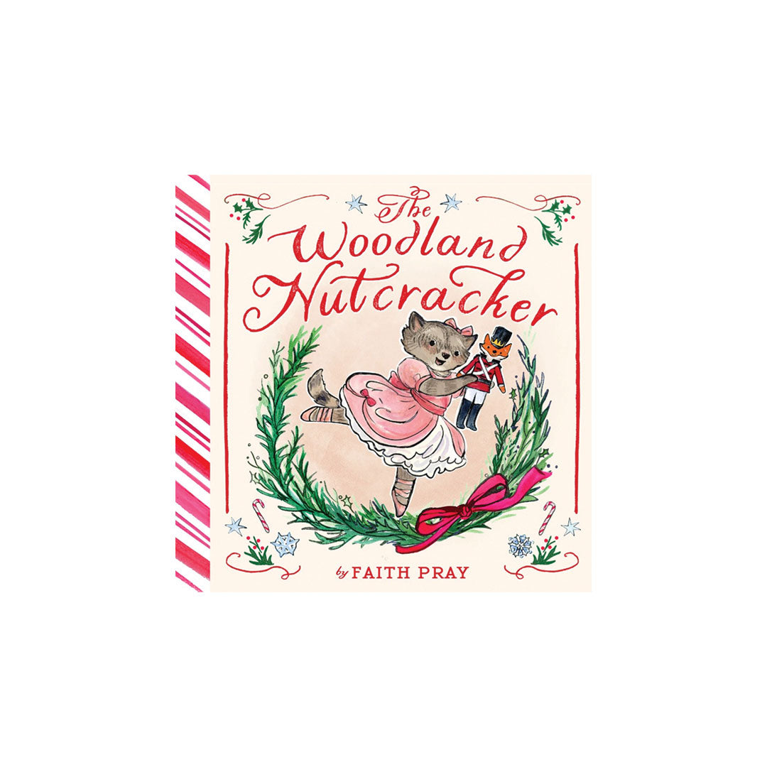 The Woodland Nutcracker book cover by Faith Pray, featuring an illustration of a nutcracker and mouse in a festive wreath, with red-and-white striped side panels on a white background.