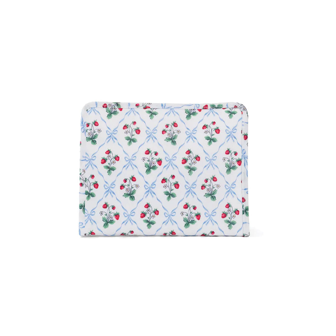 Travel pouch with berry fruit themed illustrations on a white background.
