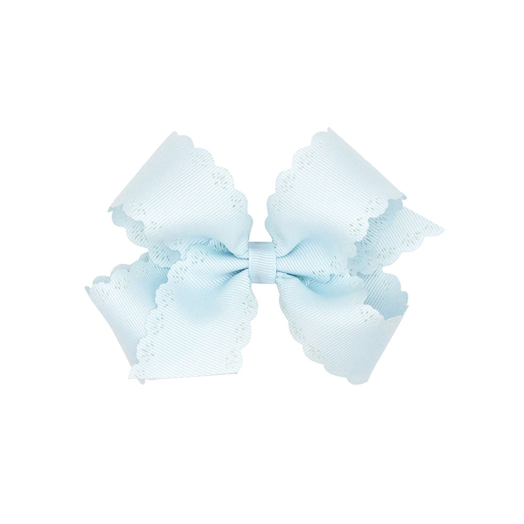 Light blue bow with scalloped edges on a white background.