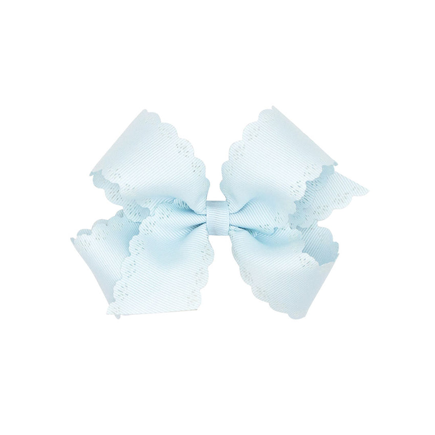 Light blue bow with scalloped edges on a white background.