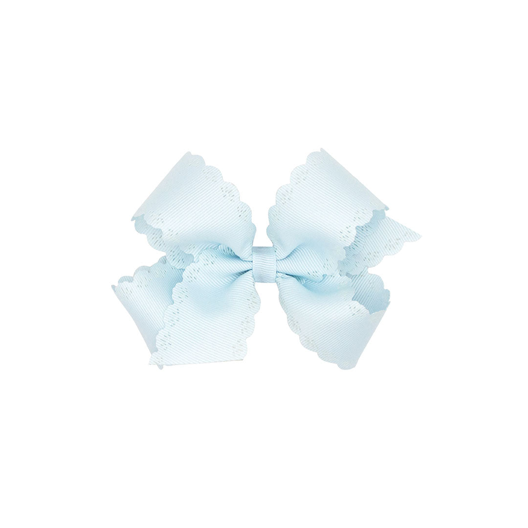 Light blue bow with scalloped edges on a white background.