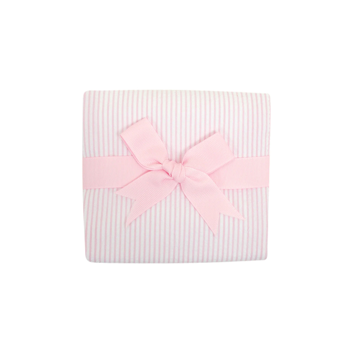 A pink seersucker burp cloth  tied with a grosgrain ribbon on a white background